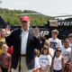 Illustration for article titled Donald Trump Gives Rides In Helicopter, Tells Kid I Am Batman